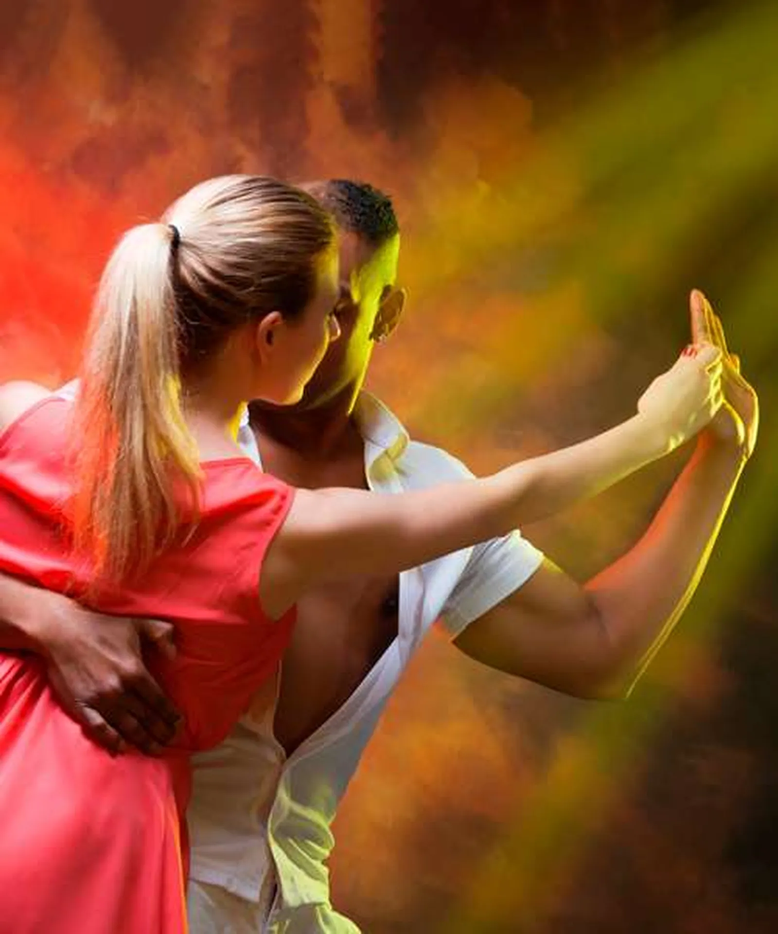 Couple dancing merengue on the beach