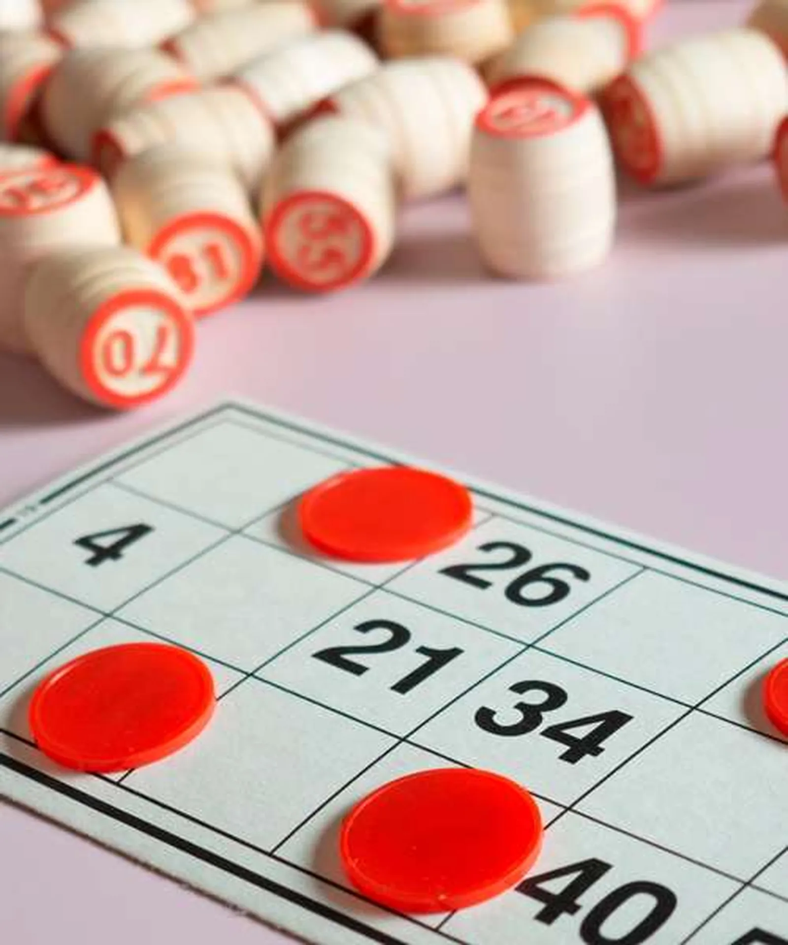 Bingo cards and pieces on a table