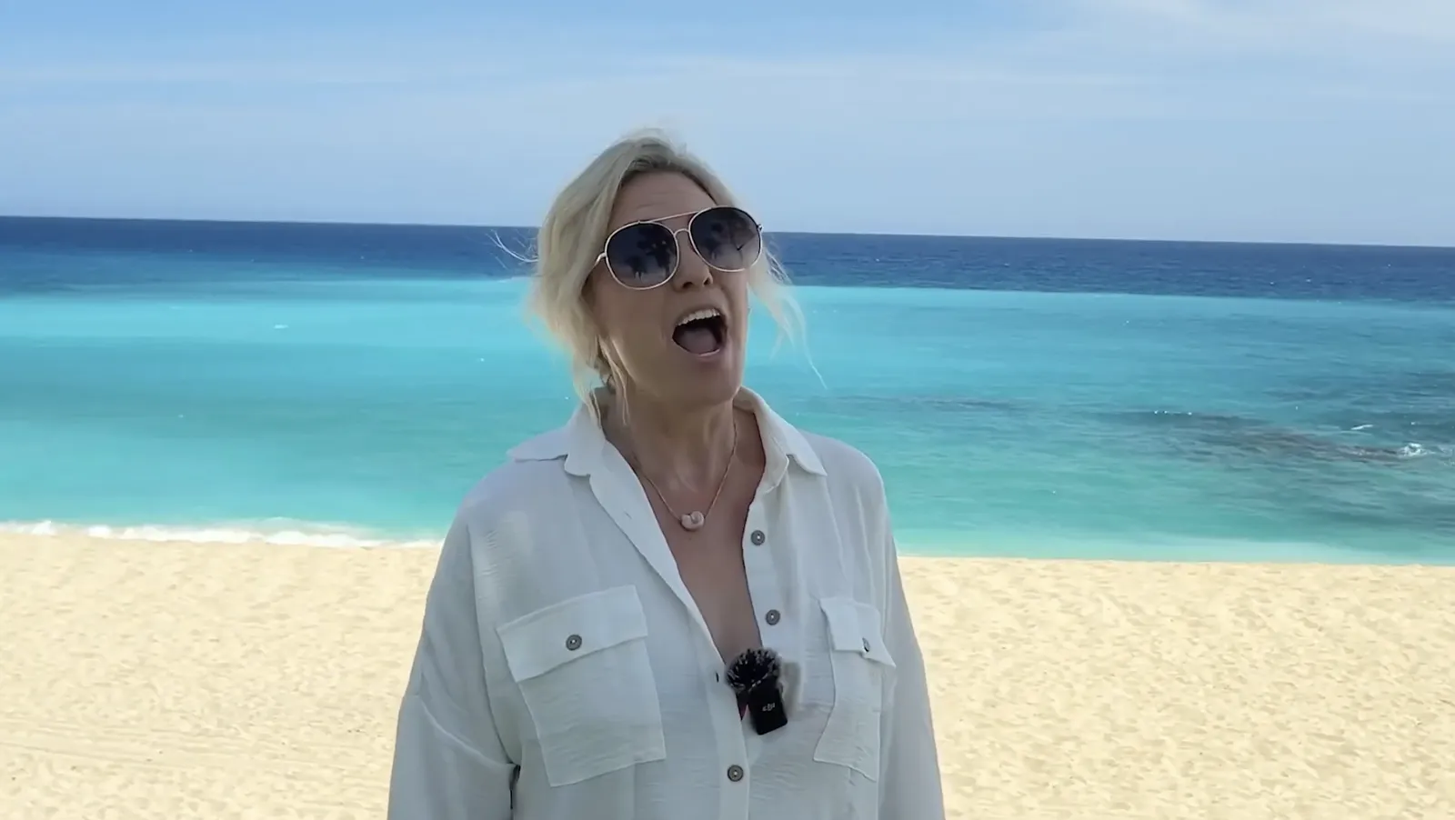 Guest testimonial video thumbnail: luxury amenities and infinity pool views